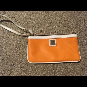 Orange Dooney and Bourke wristlet